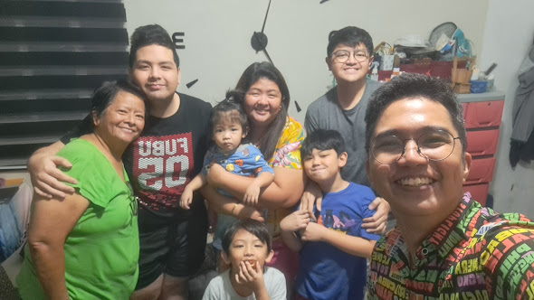 Harvey with the Bilang family